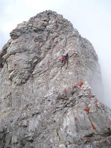 Me climbing up the second crux. Photo by Grant