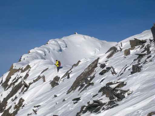 Me just about to challenge the heavily corniced summit ridge. Photo by Grant