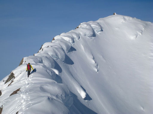 Me starting the summit ridge. Photo by Grant