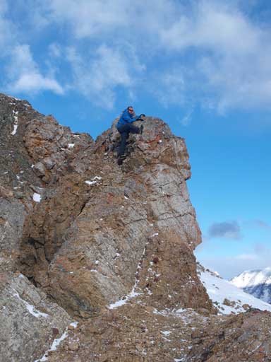 Ben playing around a boulder