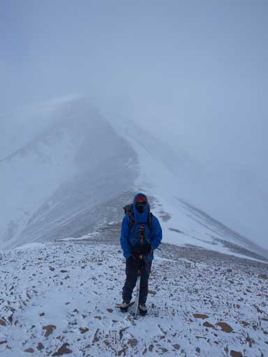 Ben on the summit ridge. Weather was quite miserable.
