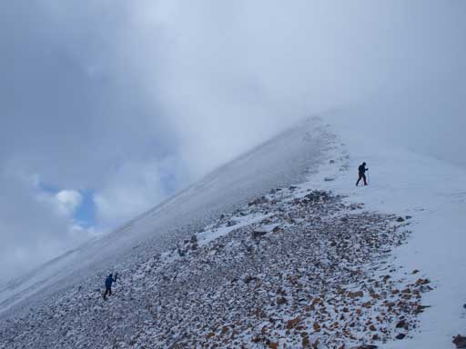 Descending the summit ridge.
