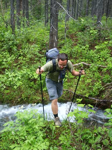 Eric crossing a stream