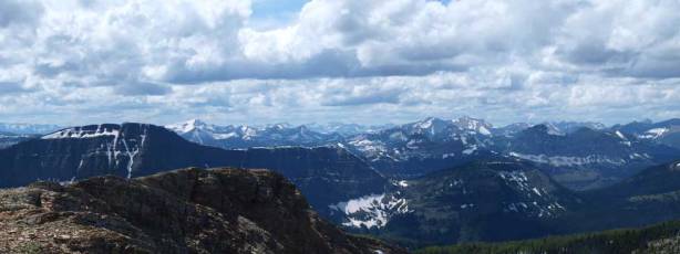 The summit of Kishenena Peak on left. Rising behind are peaks that I'm not familiar with in BC