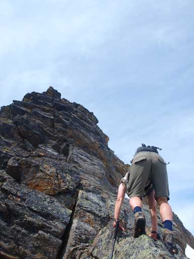 The terrain ahead would soon force us traversing climber's right.