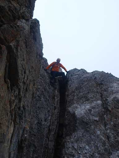 Wil starting the chimney down-climb