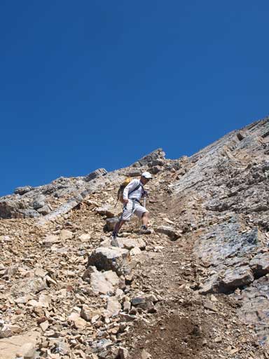 Dan descending the typical terrain.