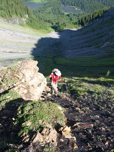 Shuan slogging up scree