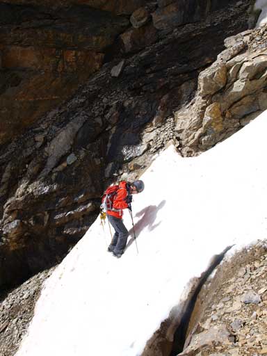 Mike crossing a tricky snow gully without crampons