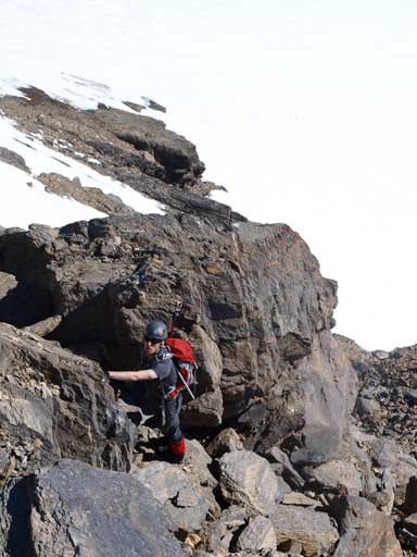Mike scrambling up typical terrain