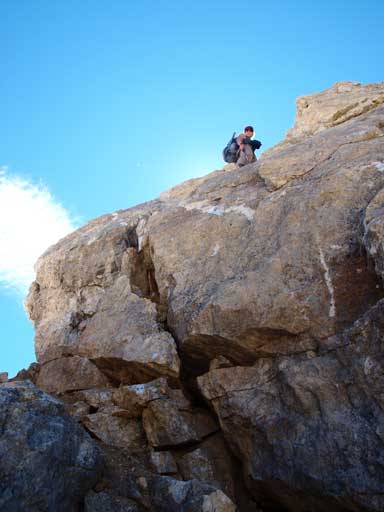 Andrea looking down the crux