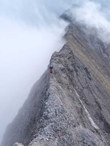 Grant negotiating an exposed ridge between 2nd and 1st part of 2nd crux.