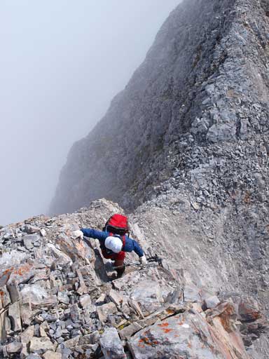 Grant climbing up the second crux
