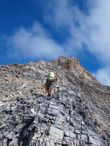 Andrea scrambling up the south ridge of Carnarvon