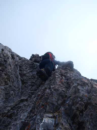 Grant scrambling up the typical terrain on this ridge