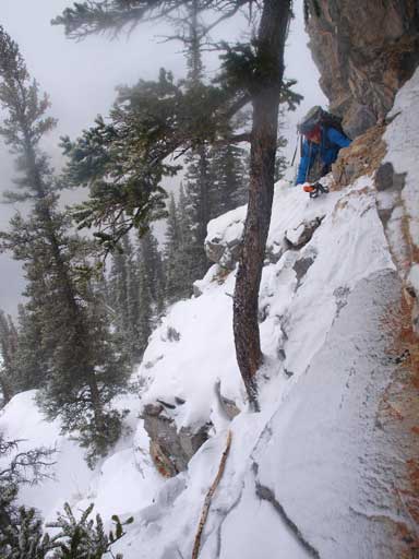 Ready to traverse the hardest part. Down-sloping slabs with very little room and considerable exposure.