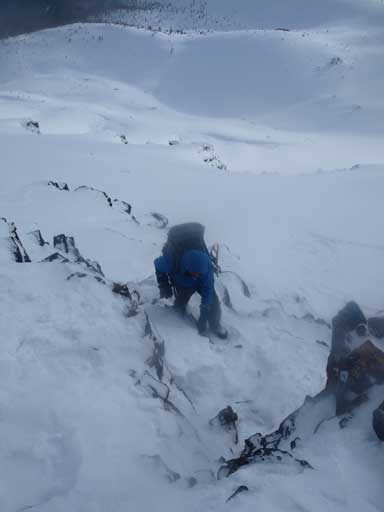 Scrambling up minor rock bands. Wet and slippery