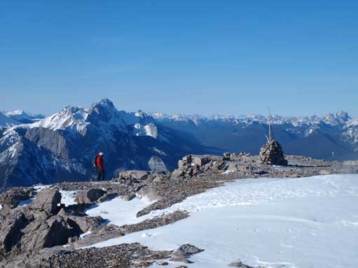Morgan and the summit cairn. Don't know which peak behind.
