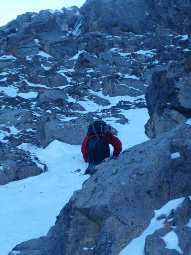 Carefully down-climbing another snow gully
