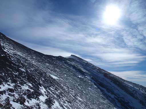 I traversed underneath the false summit. This is looking towards the true summit