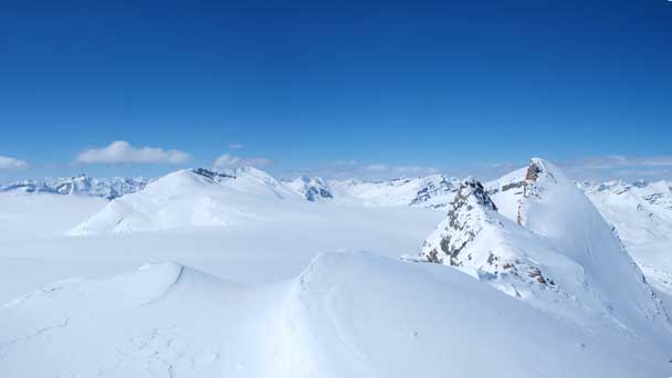 A wide shot from the first bump on the summit ridge. You can see the false summit and true summit on right.