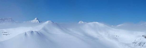 Bryce on left, Castleguard on right. In front of them are the two peaks of Mount Saskatchewan Junior, with the left peak being the summit. 