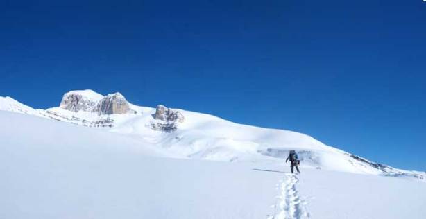 Ben breaking trail up the massive field. Not sure it's ice below or not.