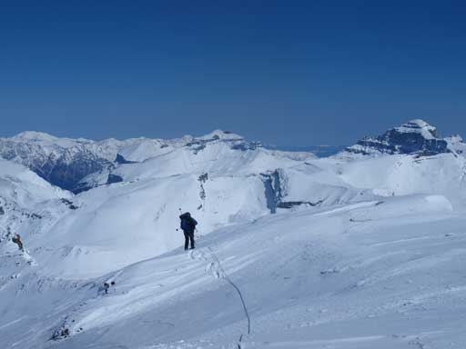 Ben walking up the summit ridge after finishing the most difficult parts