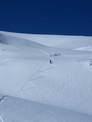 Vern snowshoeing down a steeper section