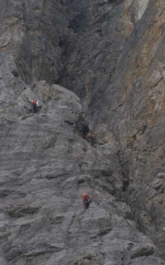 Rock climbers above