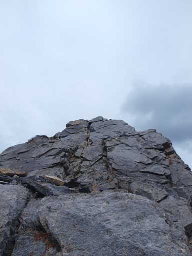The slab wall, which can be bypassed on climber's right