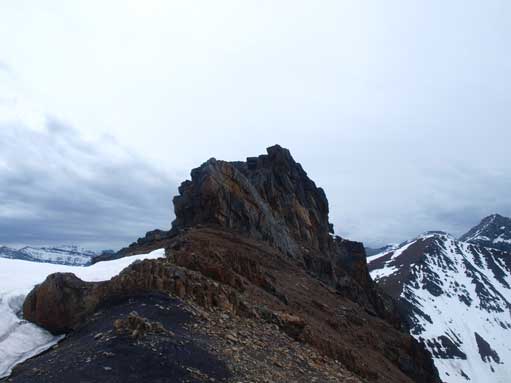 Looking back at the crux band. The way goes on the climber's left side (skier's right side).