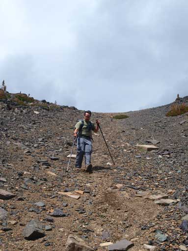Scree skiing down the upper gully