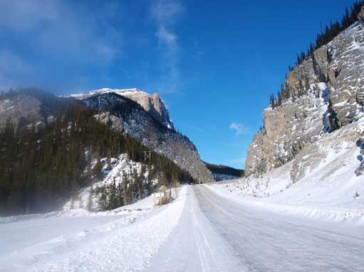 Crossing the slippery Smith Dorrien Road