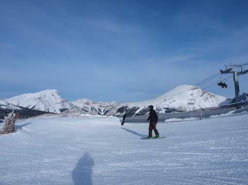 Near the summit. You can see the chairlift, and a snowboarder