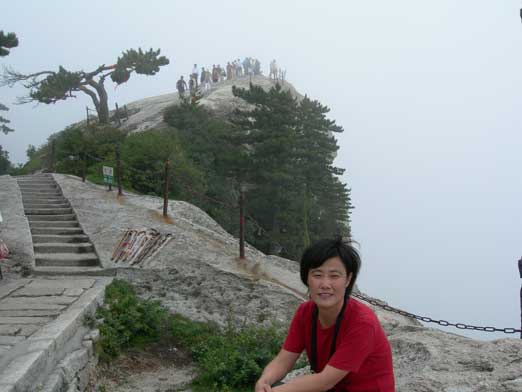 Mom near the summit of west peak. It was a grey-out up there