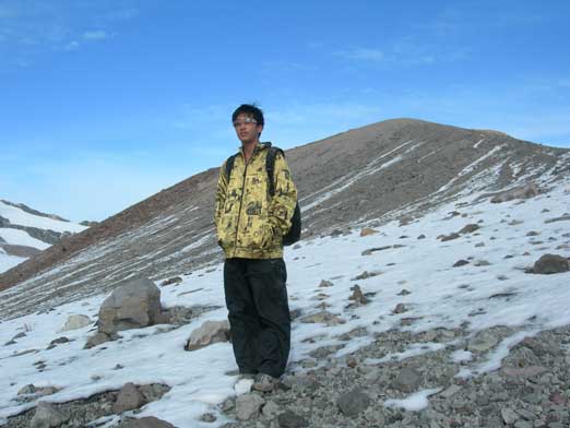Me topping out on the crater. Behind me is one of the highpoints on this Cone