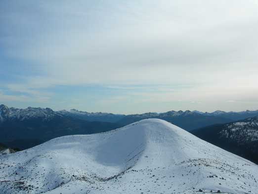 Looking south from the summit. Sky Pilot Mountain behind
