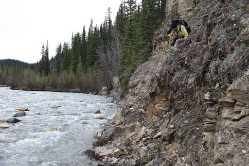 Me scrambling through a challenging part. Photo by Ben N