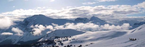 Zooming-in towards Fatigue Mountain (right of center). Note the layered clouds.