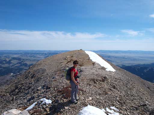 Andrea hiking back to the first summit