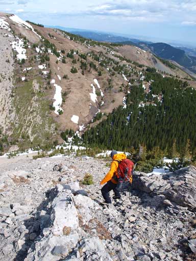 Descending rubble slope towards the col