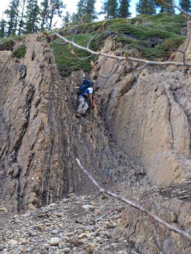Ben down-climbing another chimney. Both are steep and loose