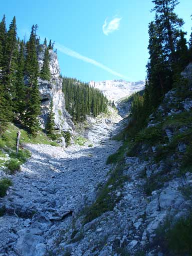 Crossing this gully. You should NOT go up this way.