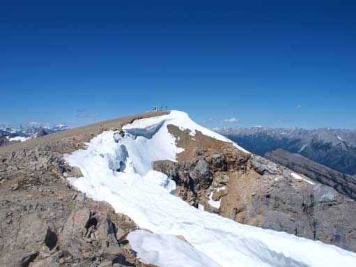 We descended a bit to a lower sub-summit to get better views. This is looking back towards the main summit