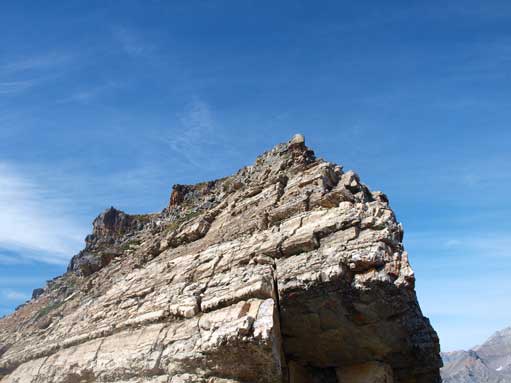 If you go up and over first peak, you will need to down-climb this. Moderate scramble though