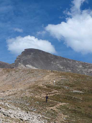 Following trails down towards 1st peak. Looking back towards false summit