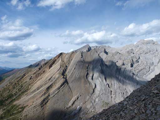 Interesting rock formation. I like the shadow of that cloud