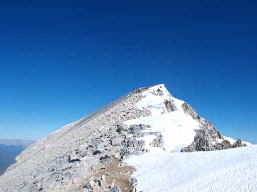 Now at the summit ridge. Note the cornices