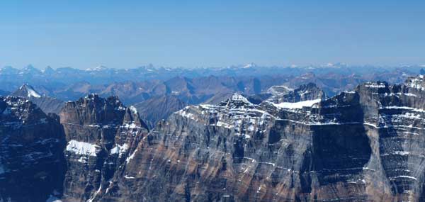 Looking over Glacier Peak towards the distant Selkirks including Mount Sir Donald